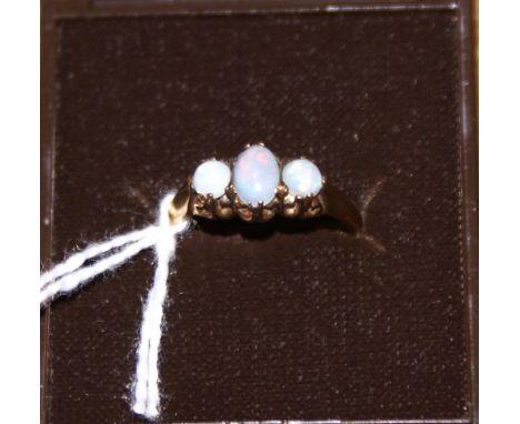 9 ct gold and three stone opal ring