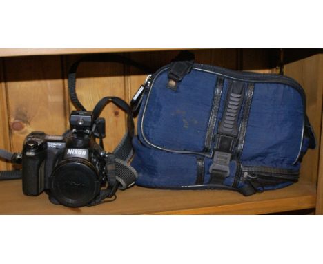 Nikon Coolpix 5700 camera with 8.9 - 71.2 mm Nikkor Zoom lens and carrying case