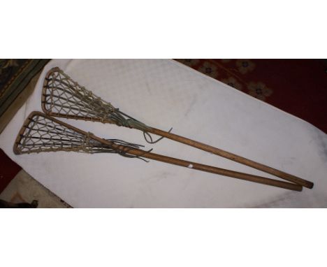 Two vintage lacrosse sticks
