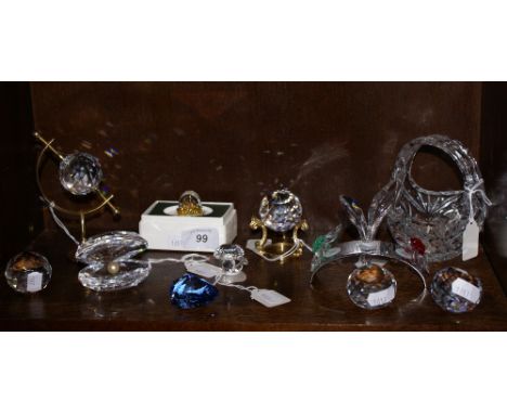 Swarovski crystal pearl in a shell, mini radio, terrestrial globe and seven other pieces