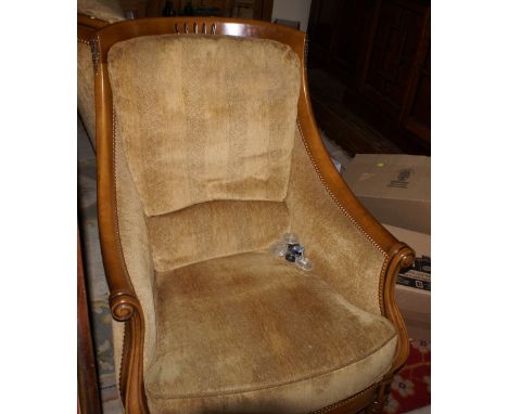 Classical style carved wood two seat sofa and armchair with gold coloured upholstery