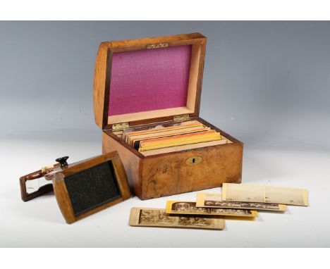 A Victorian burr walnut box, the domed lid with applied plaque, detailed 'The Stereoscopic Treasury', the interior fitted wit