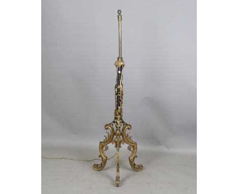 A late 19th century Rococo Revival gilt metal mounted lamp standard, height 153cm.Buyer’s Premium 29.4% (including VAT @ 20%)