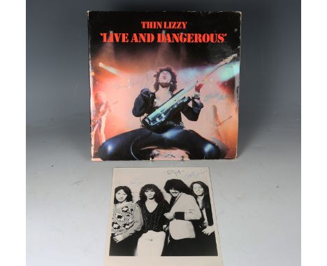 An LP record by Thin Lizzy, 'Live and Dangerous', signed to the front of sleeve by Phil Lynott, Scott Gorham and Brian Downey