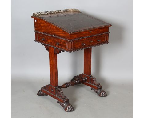 A fine Regency mahogany Davenport, probably by Gillows of Lancaster, the gilt metal gallery above a leather-inset writing slo