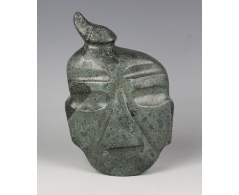 A pre-Columbian Mezcala style carved green hardstone avian mask, possibly 700 BC-300 AD, with pierced holes to rear edge and 