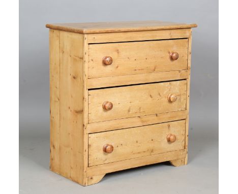 A Victorian style pine chest of three drawers, height 77cm, width 72cm, depth 34.5cm.Buyer’s Premium 29.4% (including VAT @ 2