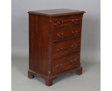 A 20th century George III style mahogany narrow chest of four oak-lined drawers, height 81cm, width 59cm, depth 37cm.Buyer’s 