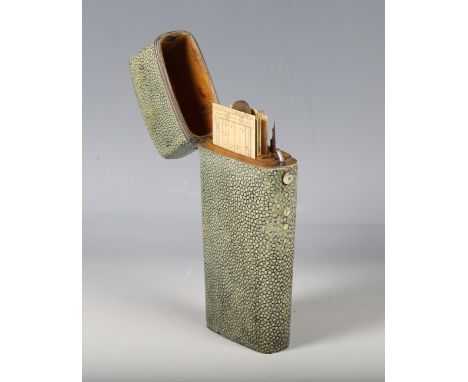 A late 18th century shagreen and white metal mounted drawing instrument case, the interior partially fitted with three ivory 