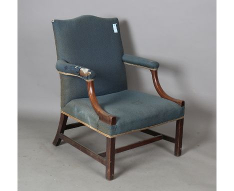A George III mahogany Gainsborough armchair, upholstered in blue fabric, raised on block legs, height 100cm, width 75cm, dept