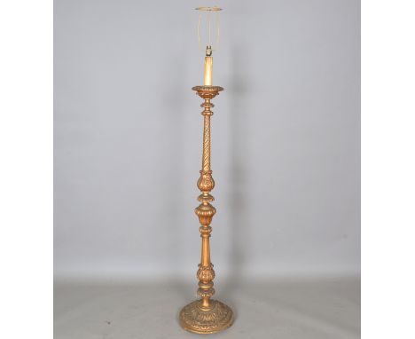 A 20th century giltwood lamp standard with carved foliate decoration, height 160cm. Note: from the contents of Runnymede Park