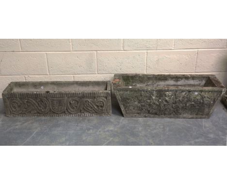 A 20th century cast composition stone rectangular garden planter, moulded in relief with shields and scrolls, height 23cm, wi