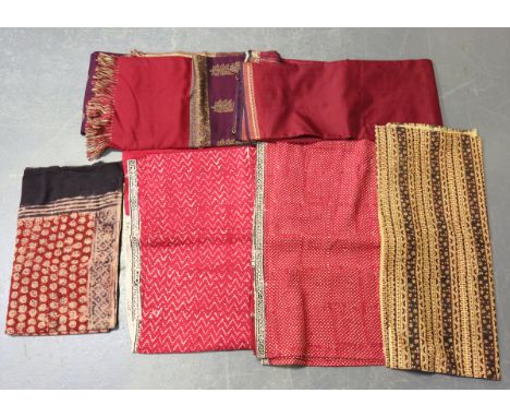 A quantity of mainly Indian fabric, including woven shawls and block printed cotton panels.Buyer’s Premium 29.4% (including V