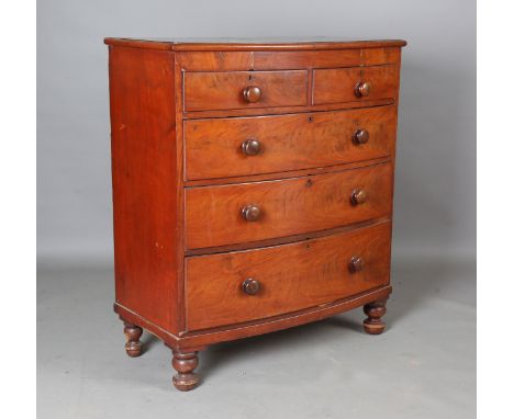A Victorian mahogany bowfront chest of two short and three long drawers, on turned legs, height 122cm, width 106cm, depth 54c