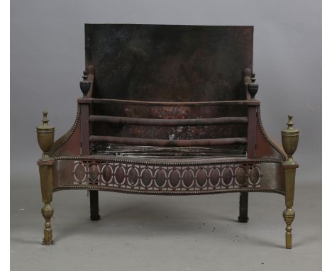 An early 20th century George III style brass and steel fire grate, height 76cm, width 90cm, together with a large 19th centur