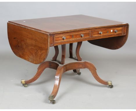 A 19th century mahogany sofa table with boxwood inlay, fitted with two frieze drawers and opposing dummy drawers, height 70cm