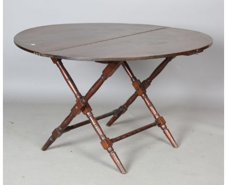 An early 20th century mahogany folding circular table by Thornton &amp; Herne, height 64cm, diameter 104cm. Note: from the co