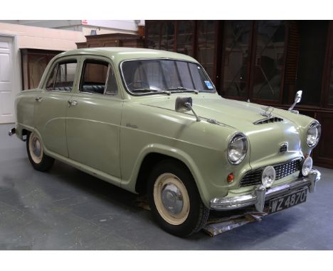 A 1955 Austin Cambridge A55 with pale green livery and original green leather seats to interior, registration number 'WZ 4870