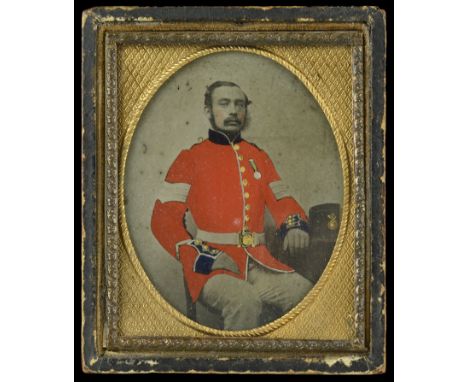 A Tinted Ambrotype of a Sergeant in the Royal Marine Light Infantry. A scarce example, 96mm x 84mm, of a Sergeant seated and 