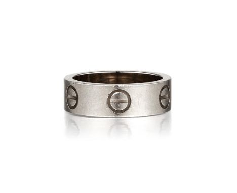 Crafted out of 18K white gold; ring size 4; weight 6.7g. Retails for $1,770.  Signed Cartier 1996; Stamped 750; Numbered M437
