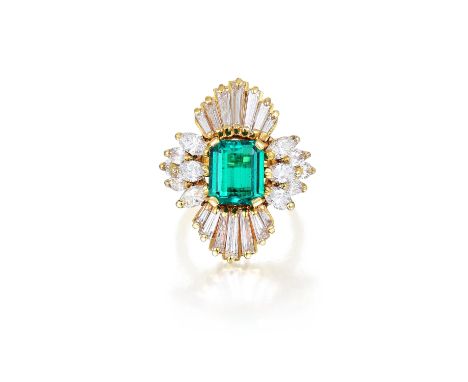 Featuring a centered emerald-cut emerald, weighing 2.45 carats, surrounded by 12 marquise-cut diamonds, weighing a total of 1