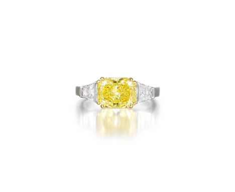 Featuring a rectangular cushion-cut Fancy Intense Yellow diamond, weighing 2.10 carats, with VS2 clarity and no fluorescence,