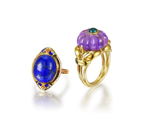 One ring is set with a carved amethyst, topped with a small round cabochon emerald, mounted in 18K yellow gold; ring size 7; 