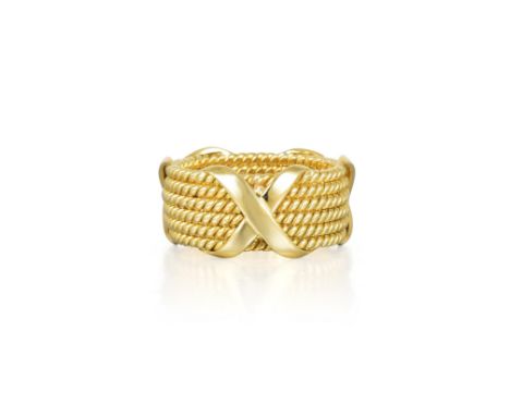 Crafted out of 18K yellow gold, designed as six rows of rope twist design, intersected by three X's; ring size 9-1/2; weight 