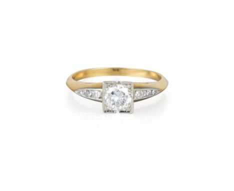 Featuring a centered brilliant-cut diamond, weighing approximately 0.50 carats, with J-K color and VS clarity, flanked by six