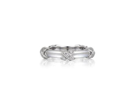 Featuring small brilliant-cut diamonds, weighing a total of approximately 0.15 carats, mounted in 18K white gold; ring size 7
