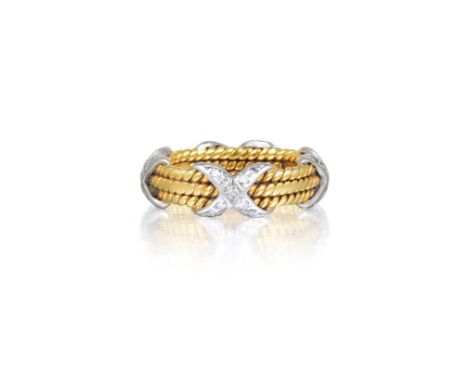 Featuring small brilliant-cut diamonds, weighing approximately 0.28 carats, crafted out of 18K yellow gold and platinum; ring