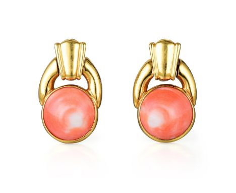 Of door knocker design, each earring features a round coral cabochon mounted in 18K yellow gold; each earring measures 4.0 x 