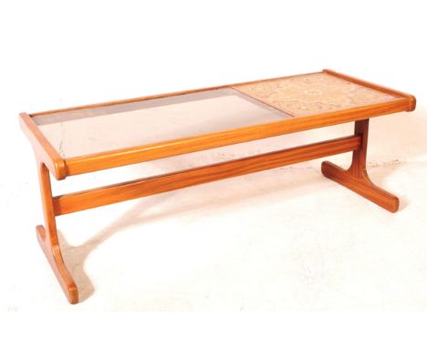 G-Plan - A mid 20th century G-Plan teak wood tile and glass topped coffee table. The coffee table raised on shaped supports t