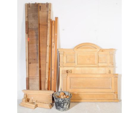 A vintage 20th century Art Nouveau style pine wood single box bed frame. Having ball finials and carved headboard / foot boar