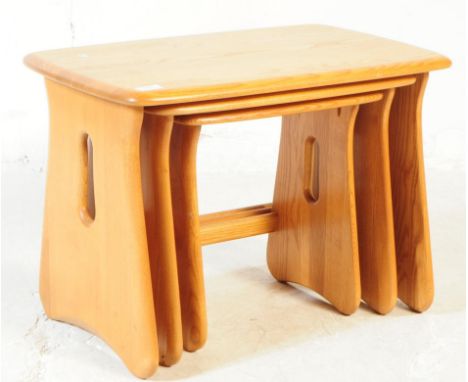 Lucian Ercolani - Ercol - Model 1159 - A mid 20th century Ercol Windsor Model 1159 beech and elm nest of tables. The tables e