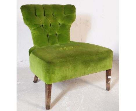 A contemporary Art Deco style velvet green armchair / easy / lounge chair. The chair having wingback with tufted front and be