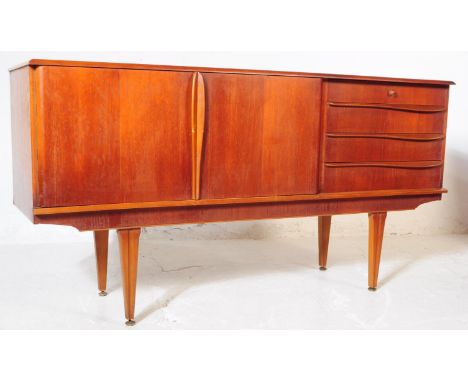 Stonehill Furniture - A retro vintage 20th Century English teak wood sideboard credenza having a bank of three drawers with f