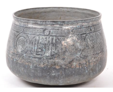 A 19th century Mamluk revival Syrian tinned copper planter. The planter / bowl having decorative geometric and Syriac script 