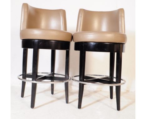 Style Matters - A pair of 20th century Art Deco style taupe brown leather barstools. The stools / chairs having stitched leat