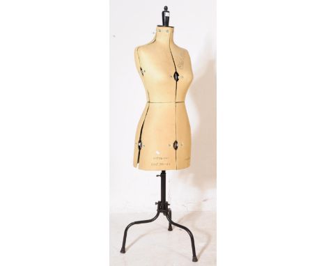 A vintage 20th century tailors mannequin dummy. The mannequin having a tripod base, with adjustable mechanism to body. Stampe