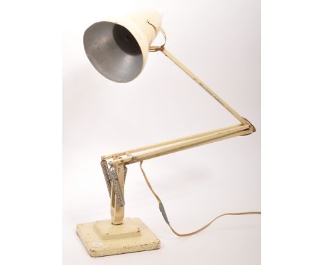 Herbert Terry - Model 1227 - A 20th century circa 1960s cream white angle poise table lamp. The lamp having conical shade ove