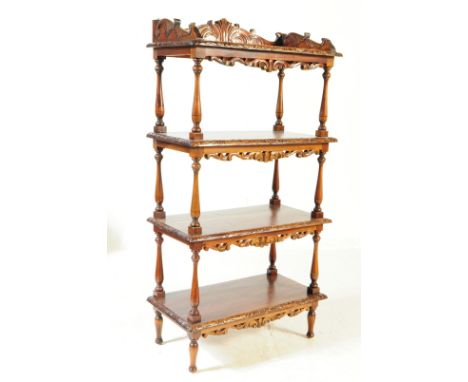 Victorian 19th century carved&nbsp; walnut whatnot / etagere / buffet. The whatnot raised on turned feet, having a series of 