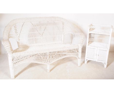 A mid Century retro rattan weave conservatory suite painted white. Comprising of two seater settee, an armchair, small round 