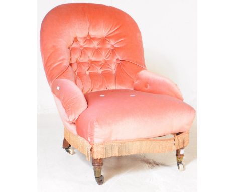 A 19th century velvet upholstered button back nursing chair. The chair raised on short turned legs to front over castors, uph