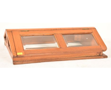 A vintage 20th century oak and glass museum cabinet top. Apex form with hinged lids to each side set with beveled edge glass 