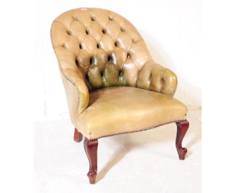 Chesterfield style - A 20th Century leather button back Chesterfield manner armchair. The chair having button back design to 