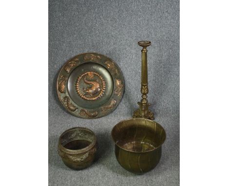 A brass ecclesiastic style candlestick along with two metal pots and a tray. H.71cm. (largest). 
