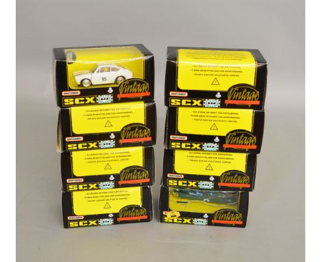 8 boxed SCX slot cars, which includes; #83940.20 Ford GT40 Vintage etc (8)