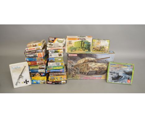 28 boxed plastic model Military related&nbsp; kits by Matchbox, Italeri, Dragon and others, in various different scales inclu