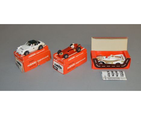 3 boxed Marklin Sprint slot car models including 1301 Ferrari, 1318 Porsche (Polizei) and 1327 Porsche 936. Overall appear G/